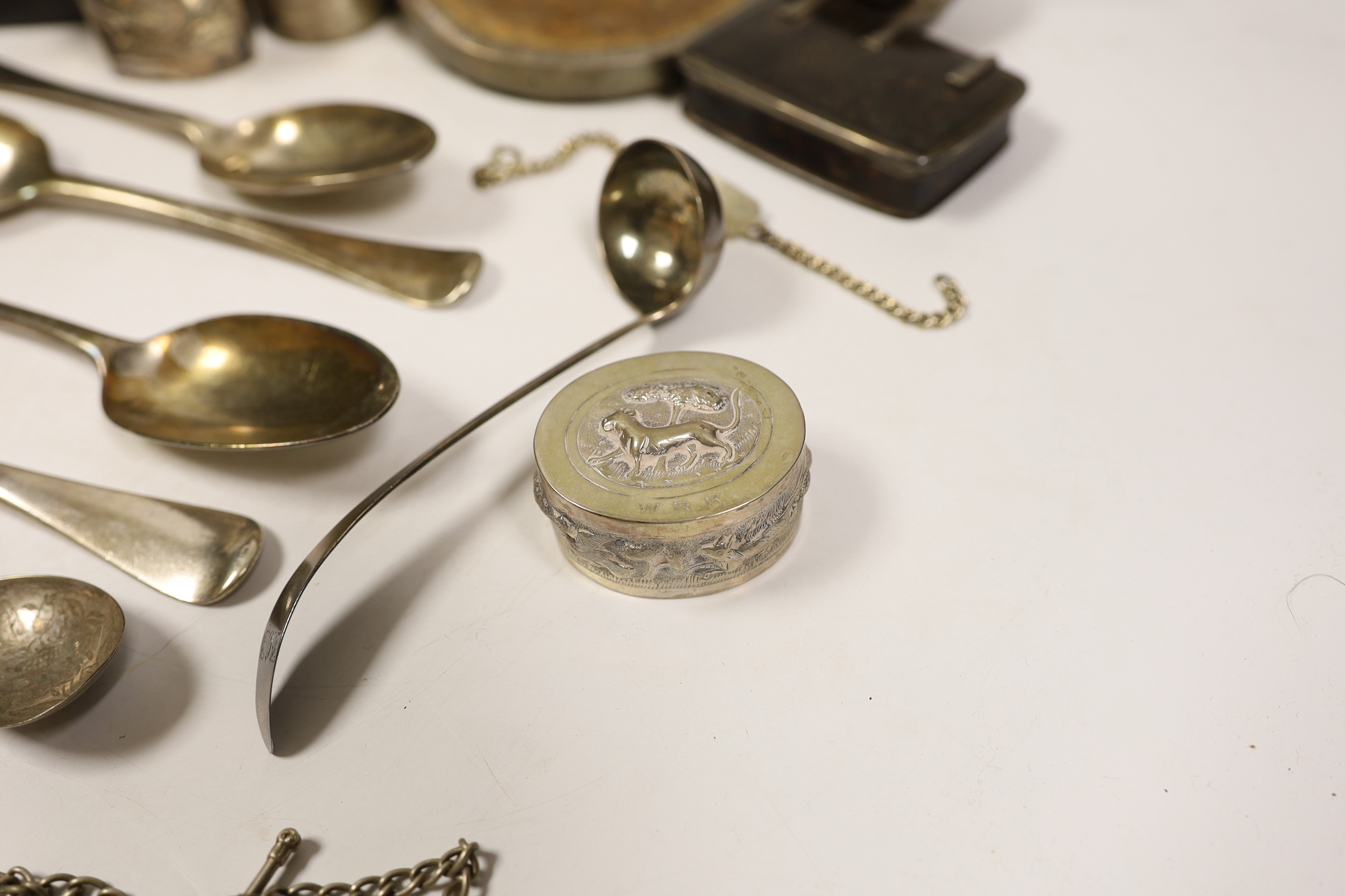 Assorted silver items including a silver mug engraved with signatures and inscription relating to Lieut. Commander S.J.M.P. Kirkness, R.N.R., London, 1942, 13cm, four 18th century base mark table spoons, a George IV cadd